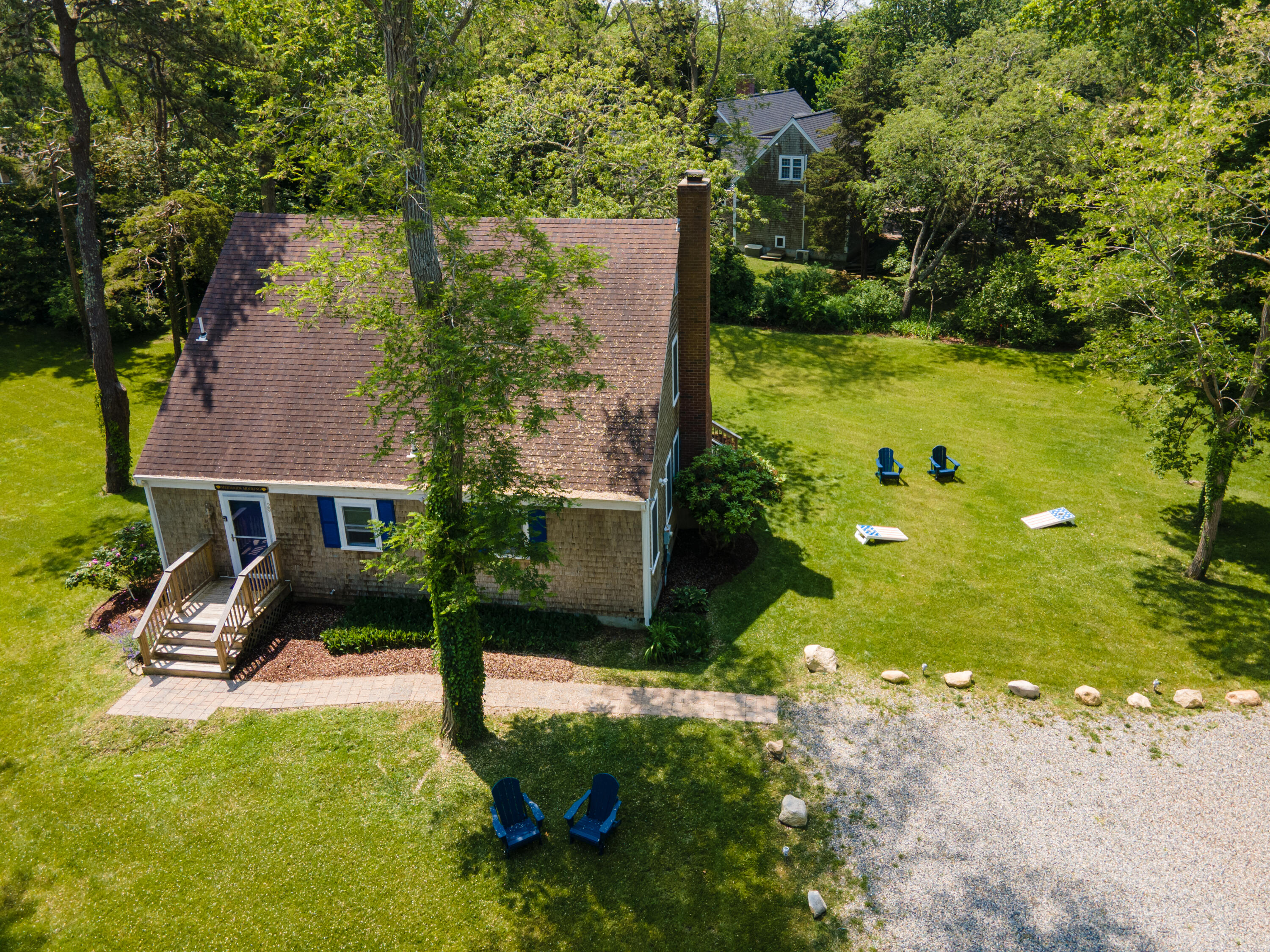29 Pilgrim Road Dennis, MA 02638 - Photo 4 of 54 a view of a house with backyard
