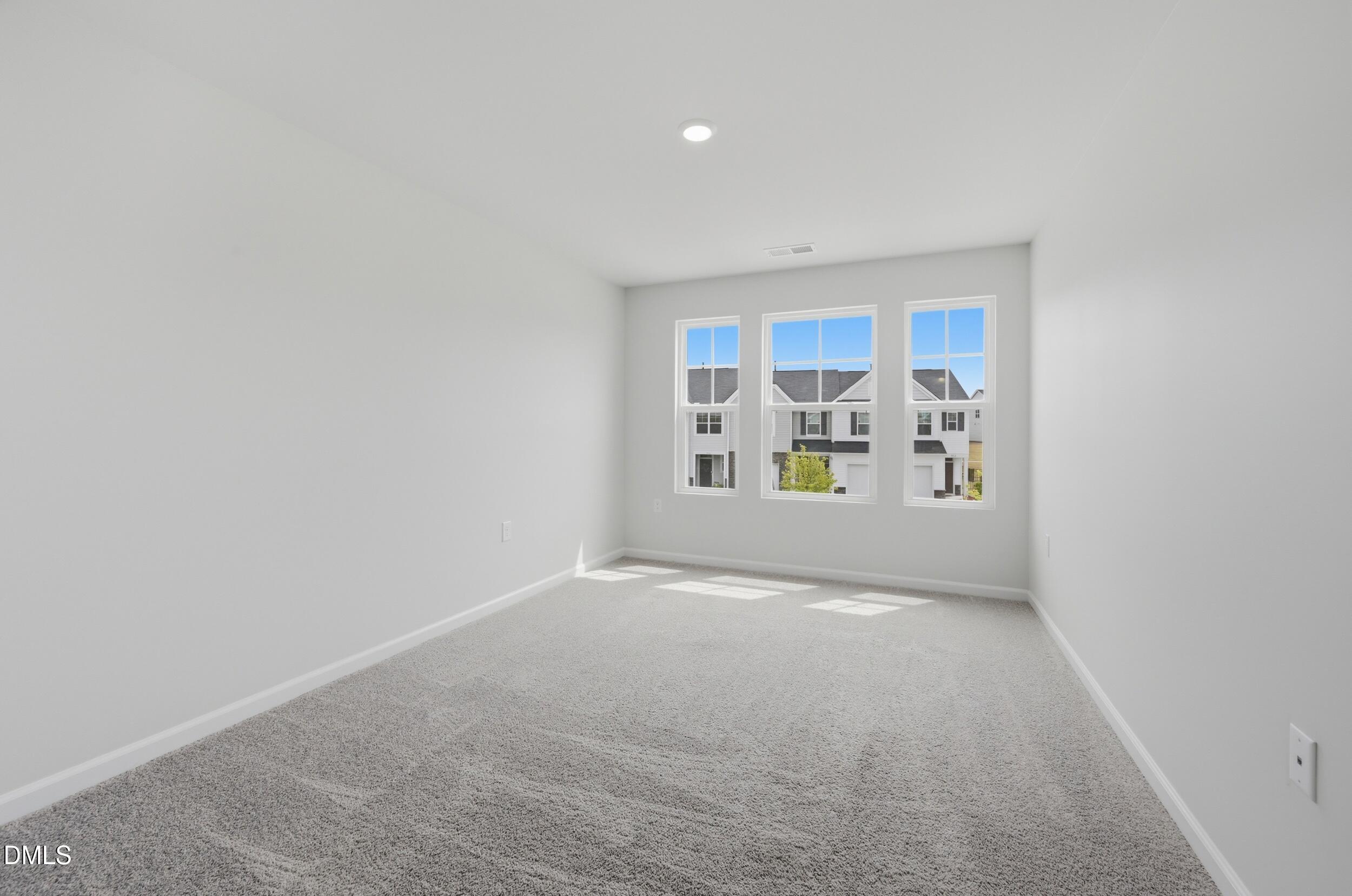 5011 Kota Street Raleigh, NC 27610 - Photo 20 of 42 a view of an empty room with a window