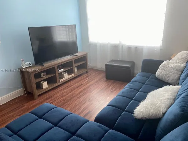 a view of front door and bedroom