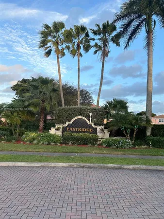 a view of a car parked in front of house