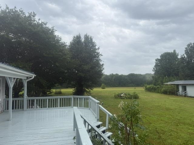 1100 Pine Top Road Toone, TN 38381 - Photo 28 of 40 Spacious outdoor deck featuring a painted railing system and steps