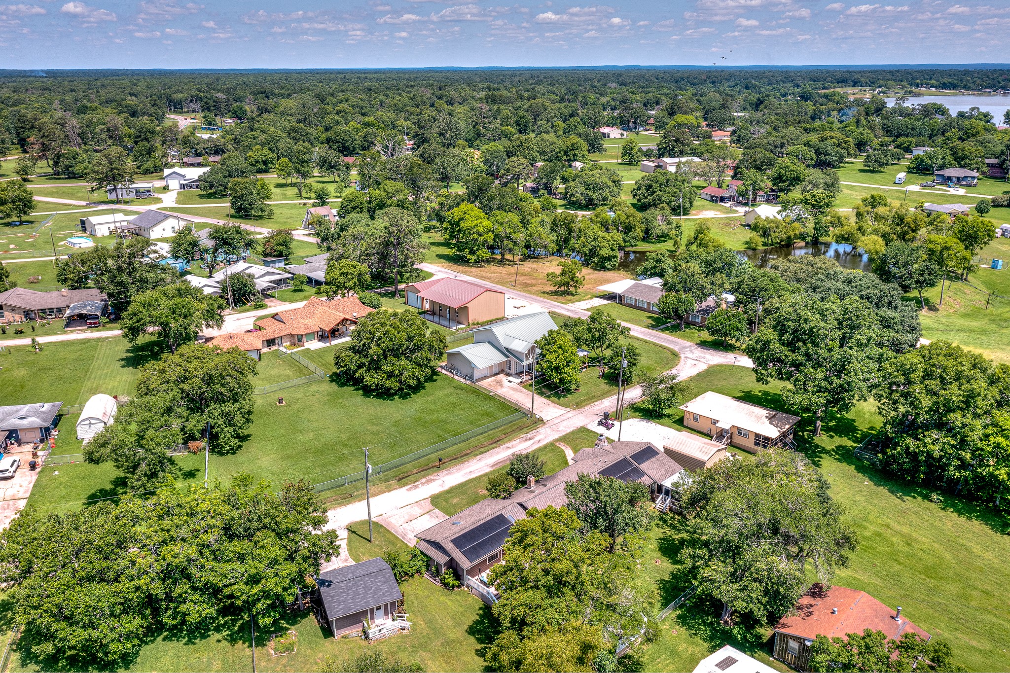 20 Clearview Point Blank, TX 77364 - Photo 42 of 44 a view of a city with lush green forest