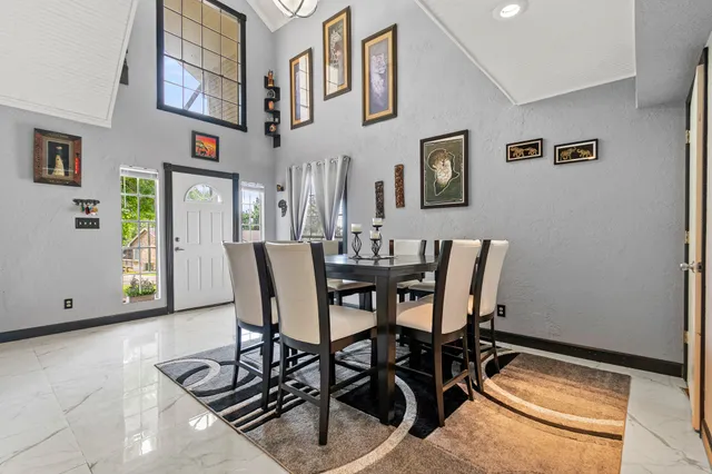 a view of a dining room with furniture