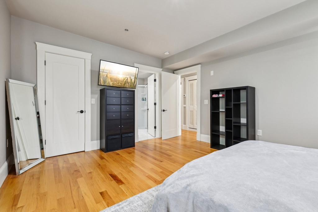 51 Hamilton Street, Unit 3 Boston, MA 02125 - Photo 16 of 21 a bedroom with a bed and closet