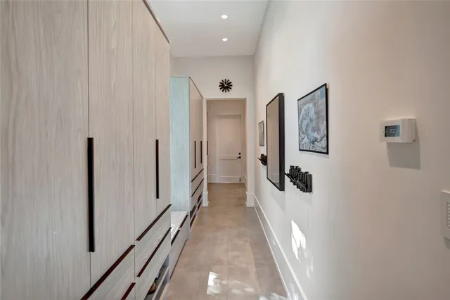 a view of a hallway with a furniture