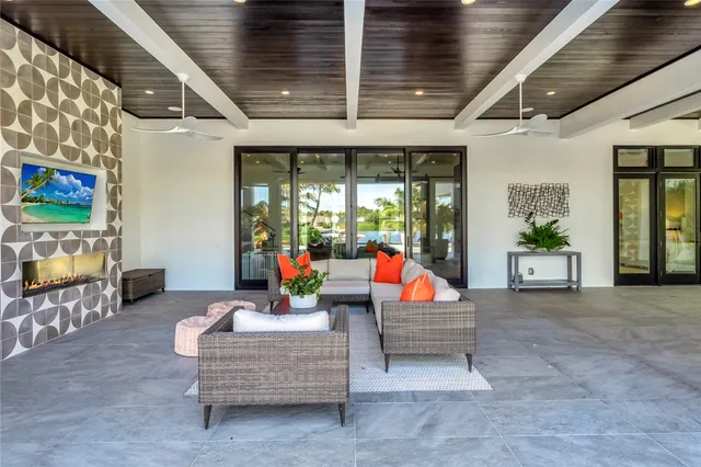 a outdoor dining space with furniture and outdoor view