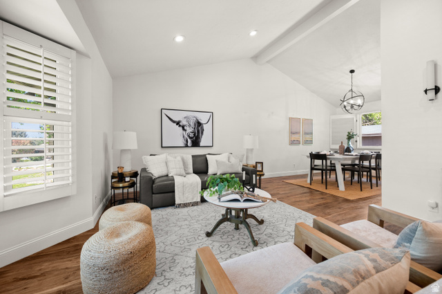 2163 Borg Drive Sandy, UT 84092 - Photo 2 of 31 Living room featuring wood finished floors and vaulted ceilings