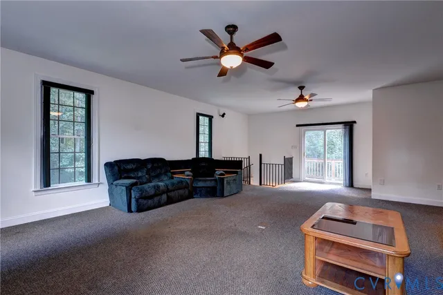 a bathroom with a granite countertop sink mirror and shower