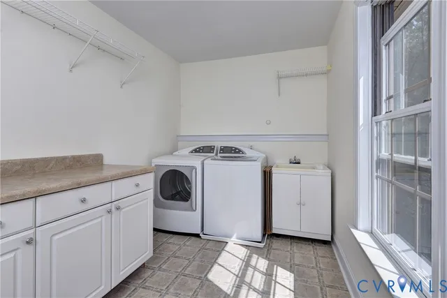 swimming pool view with a seating space and a garden view