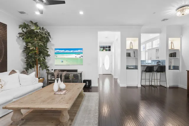 a living room with furniture and a table