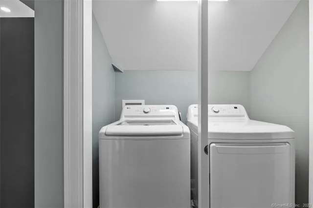 a utility room with dryer and washer