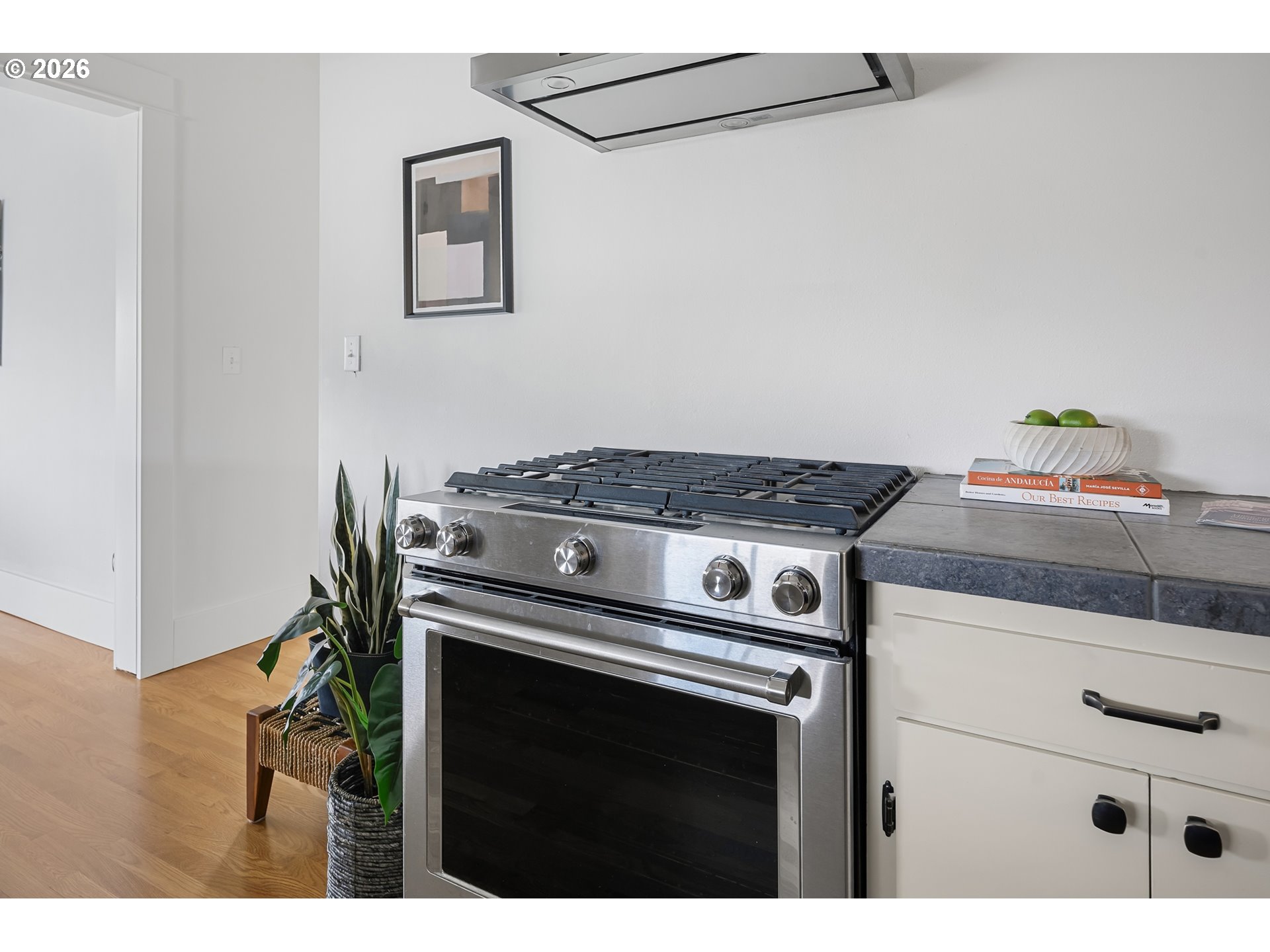 2845 Northeast 53rd Avenue Portland, OR 97213 - Photo 13 of 29 a close up of a stove top oven sitting inside of a kitchen