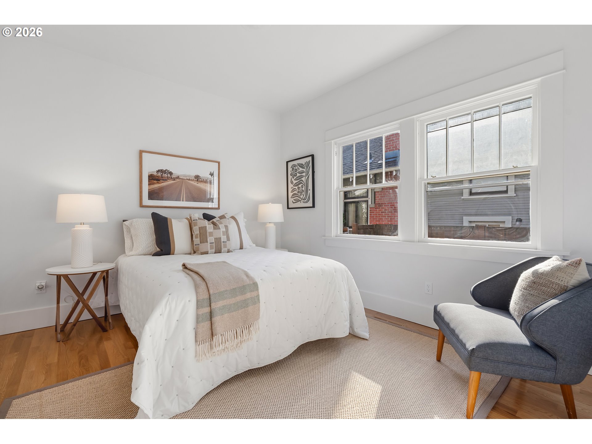 2845 Northeast 53rd Avenue Portland, OR 97213 - Photo 15 of 29 a bedroom with a bed and a chair