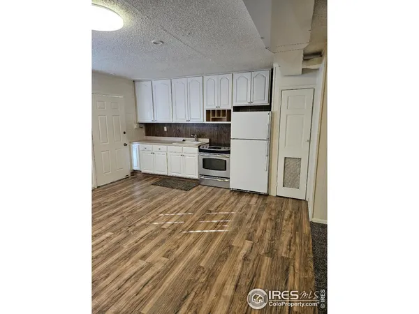 a bathroom with a sink toilet and a mirror