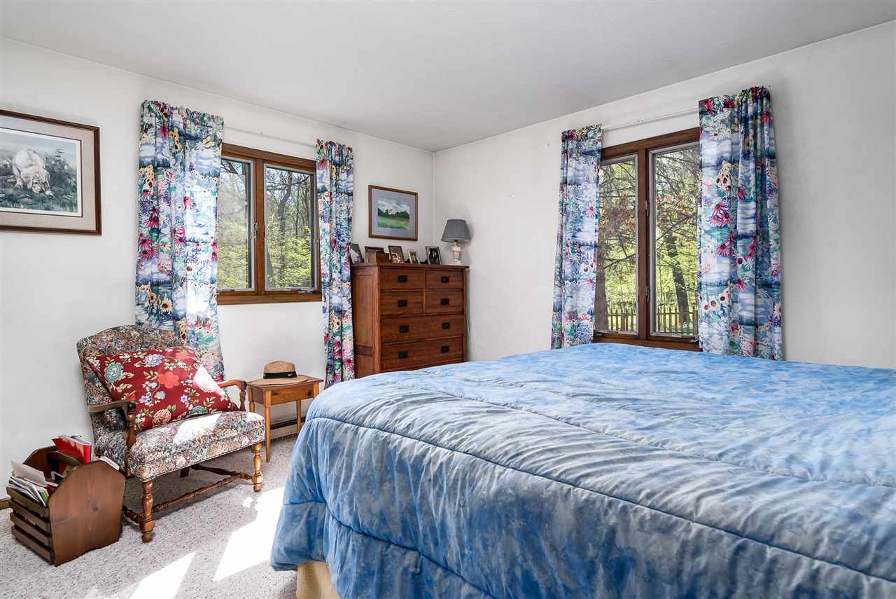 3310 East Whitaker Road Byron, IL 61010 - Photo 8 of 25 a bedroom with a bed and furniture