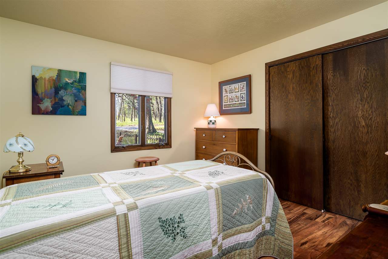 3310 East Whitaker Road Byron, IL 61010 - Photo 10 of 25 a bedroom with a bed and a window