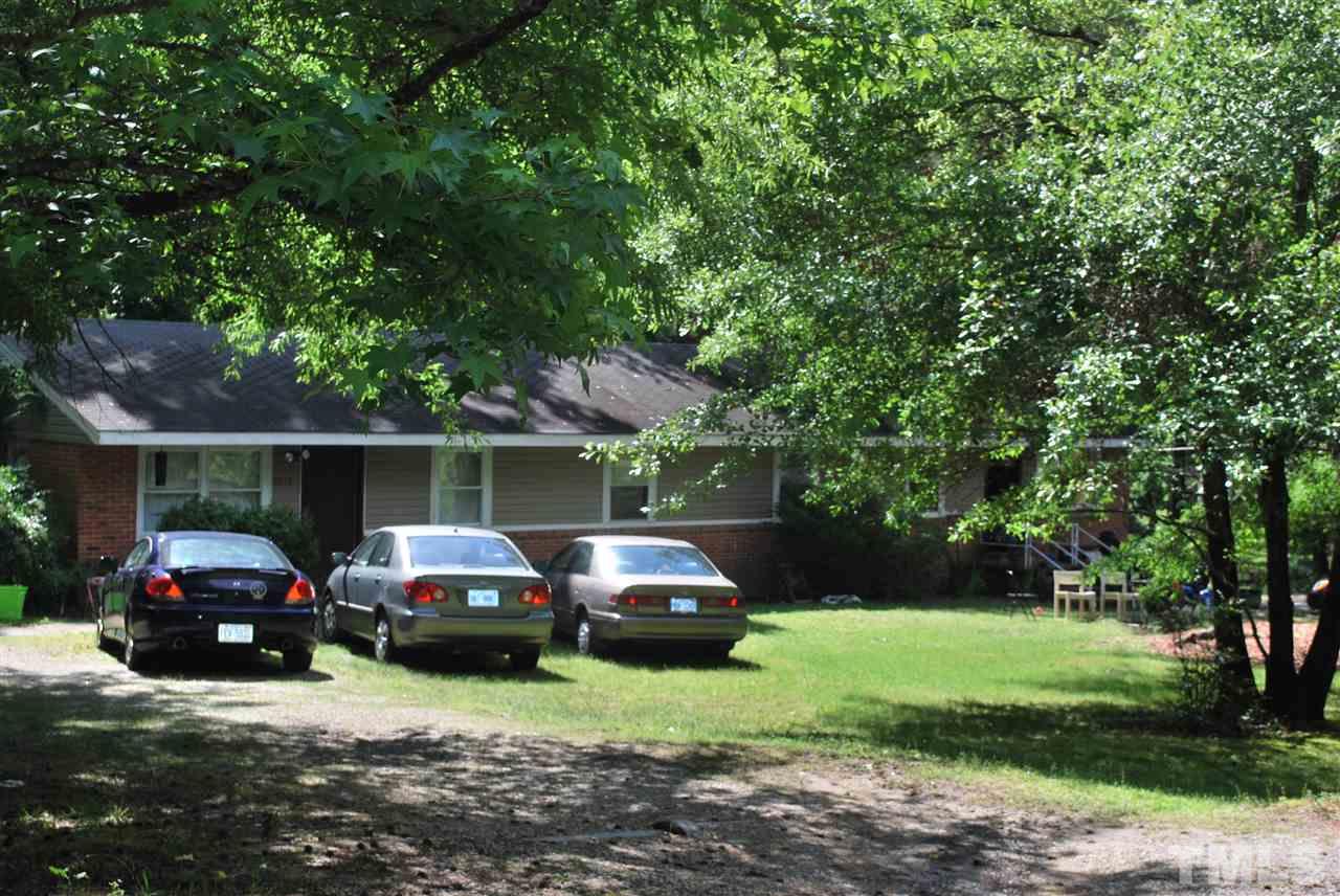 5815 Hilltop Road Raleigh, NC 27603 - Photo 1 of 3 a house view with a car parked in front of house