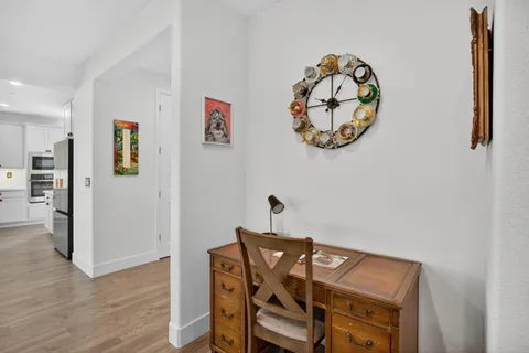 a view of workspace with wooden floor