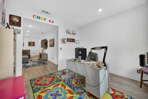 a bed room with furniture and a table