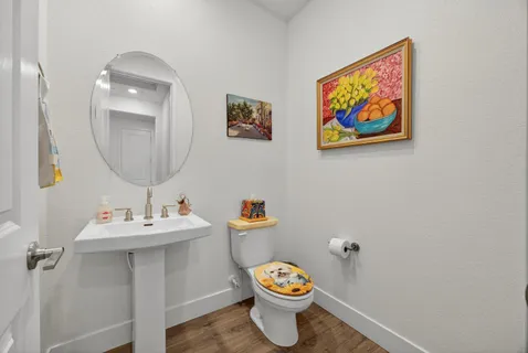 a workspace with furniture bookshelf and a window
