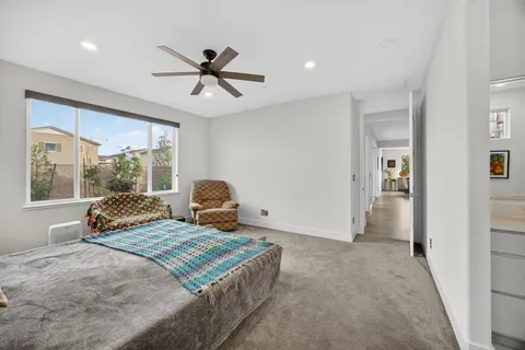 a spacious bathroom with a double vanity sink shower and mirror