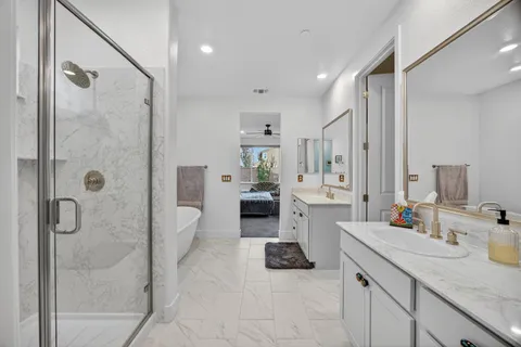 a view of a house with a yard and sitting area