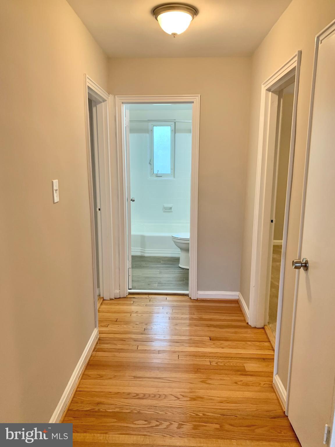 2615 13th Road South Arlington, VA 22204 - Photo 14 of 41 a view of an empty room with wooden floor