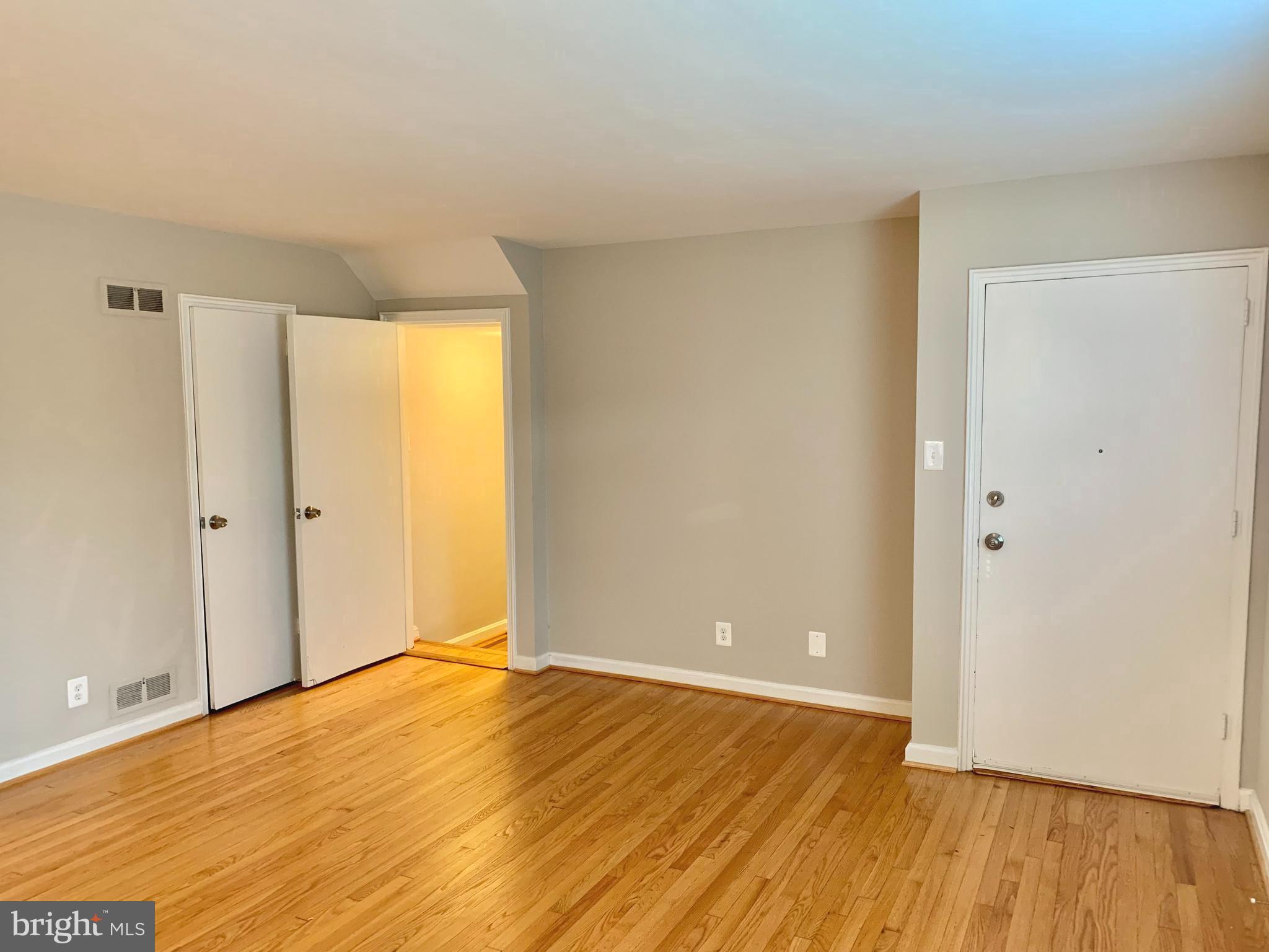 2615 13th Road South Arlington, VA 22204 - Photo 21 of 41 a view of an empty room with wooden floor