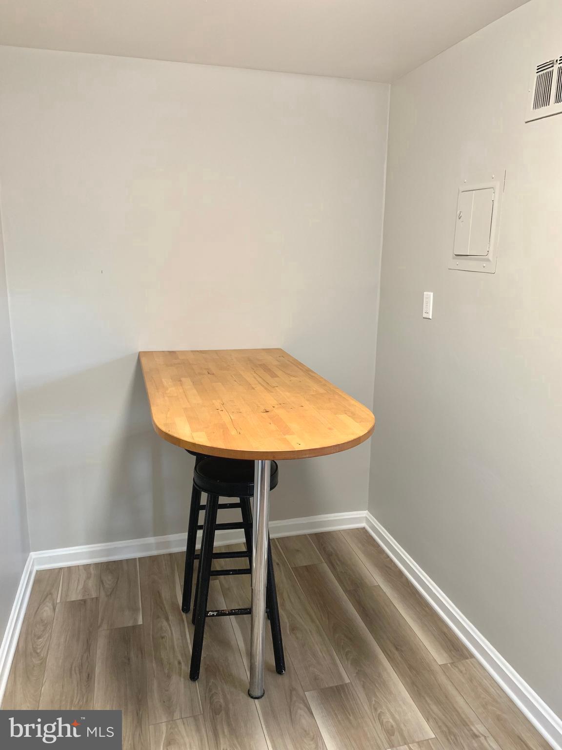 2615 13th Road South Arlington, VA 22204 - Photo 33 of 41 a view of small space with wooden floor and a table