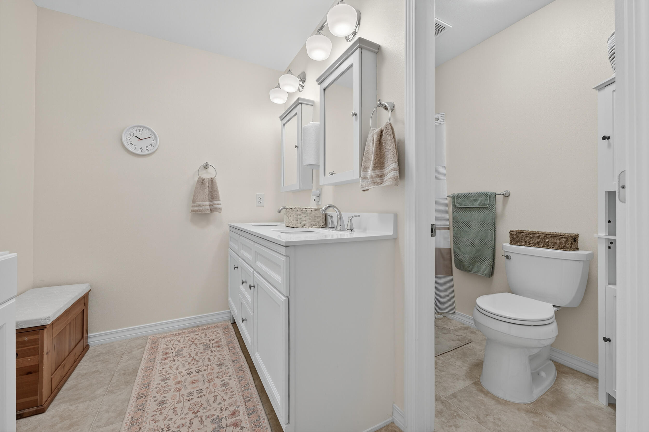105 Cedar Point Road Crestview, FL 32539 - Photo 12 of 53 a bathroom with a sink a toilet and a mirror