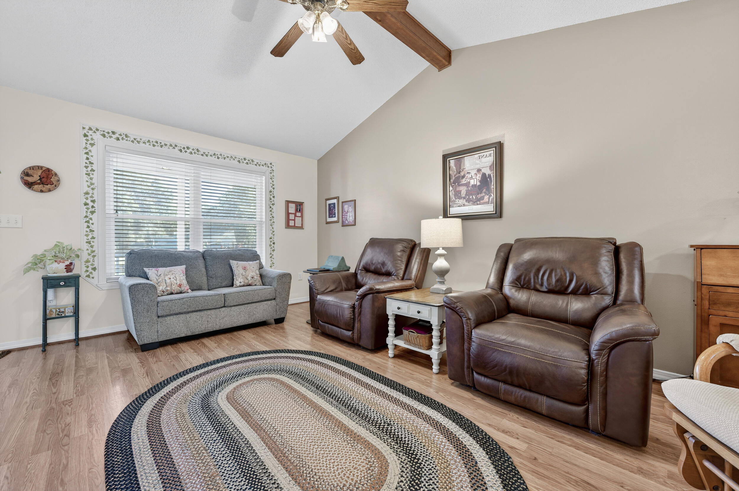 105 Cedar Point Road Crestview, FL 32539 - Photo 16 of 53 a living room with furniture and a large window