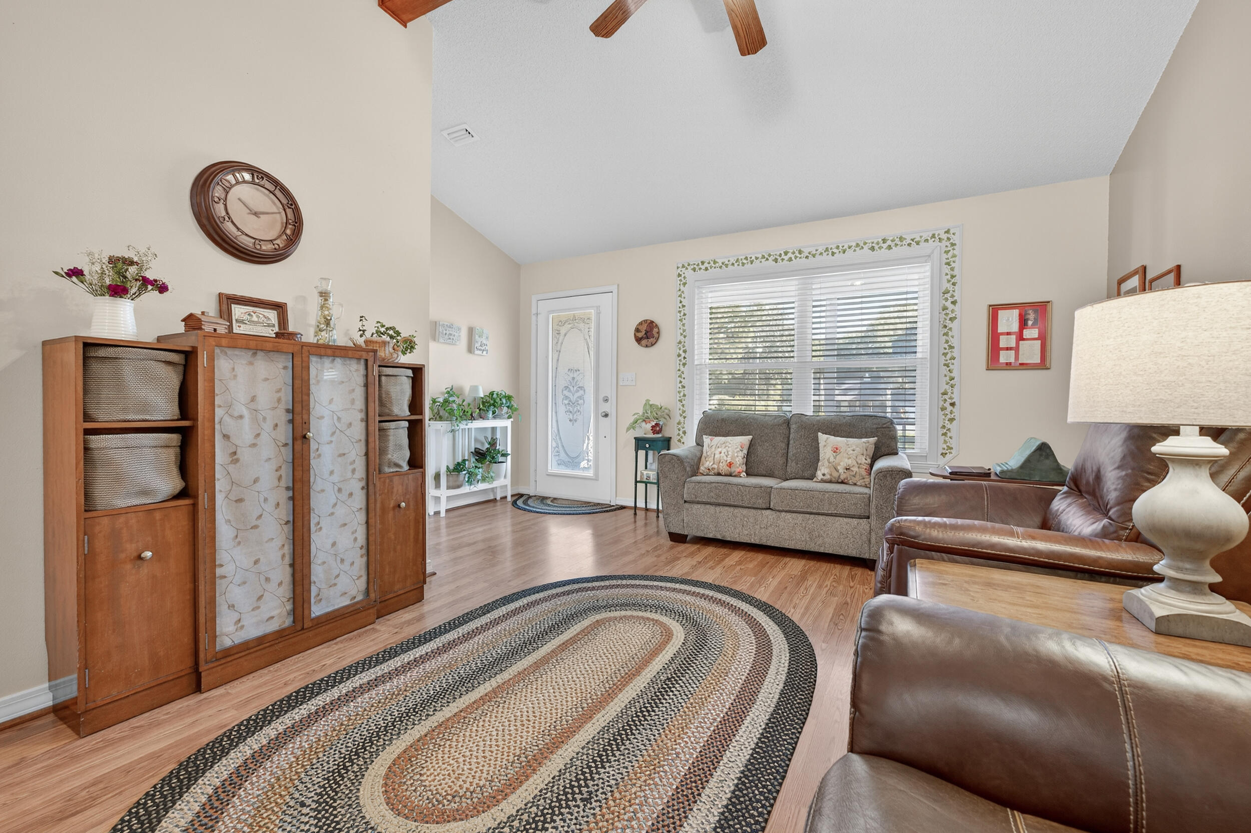 105 Cedar Point Road Crestview, FL 32539 - Photo 17 of 53 a living room with furniture and a large window