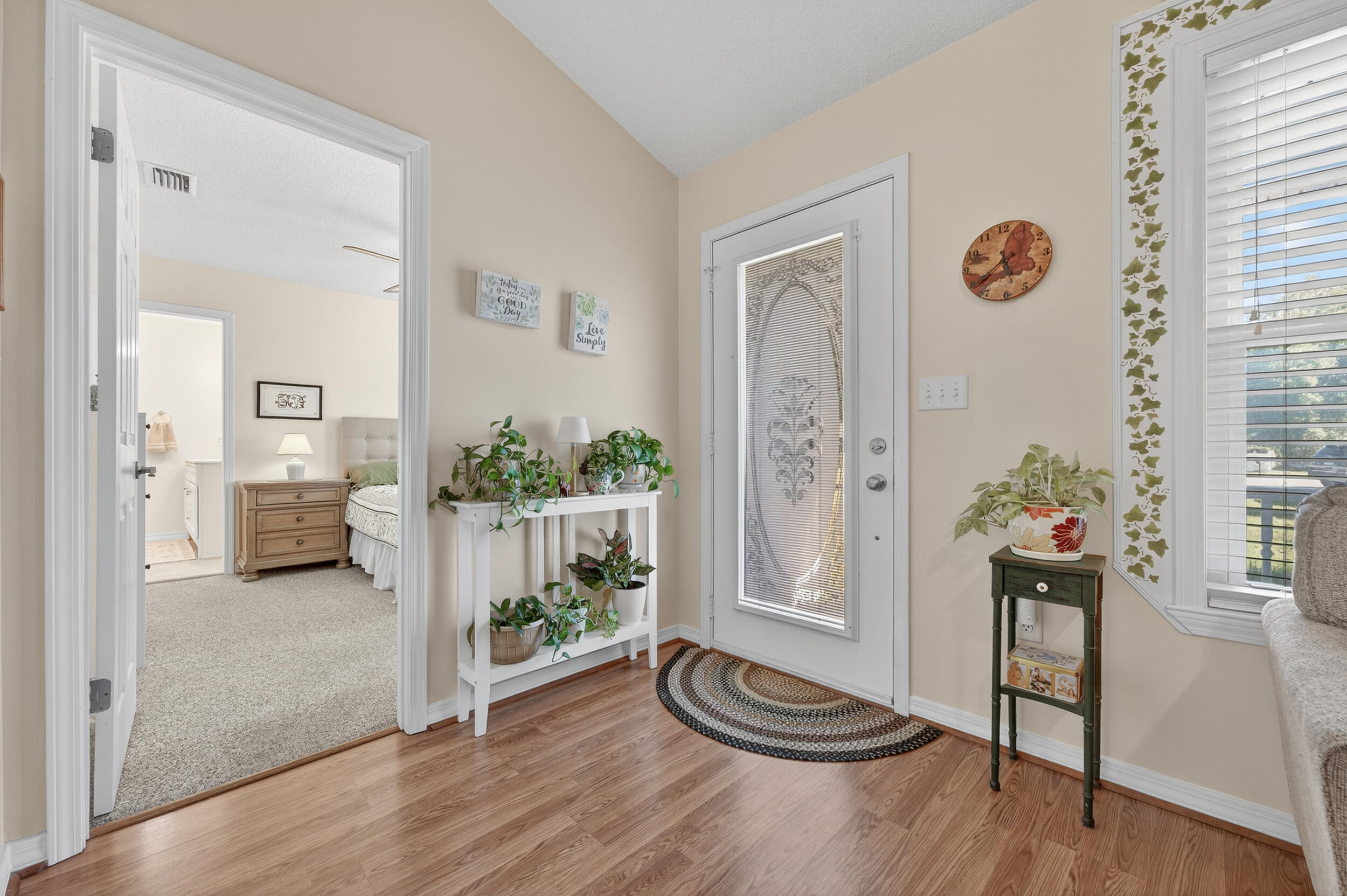 105 Cedar Point Road Crestview, FL 32539 - Photo 18 of 53 a view of a livingroom with wooden floor and furniture