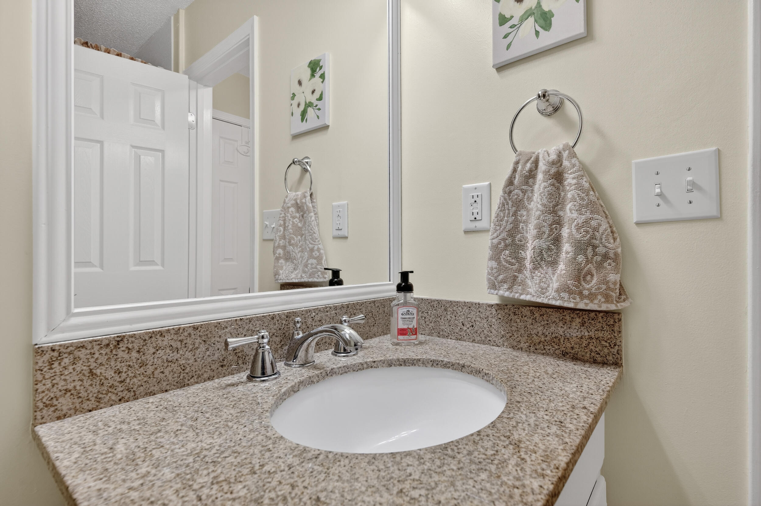 105 Cedar Point Road Crestview, FL 32539 - Photo 36 of 53 a bathroom with a granite countertop sink and a mirror