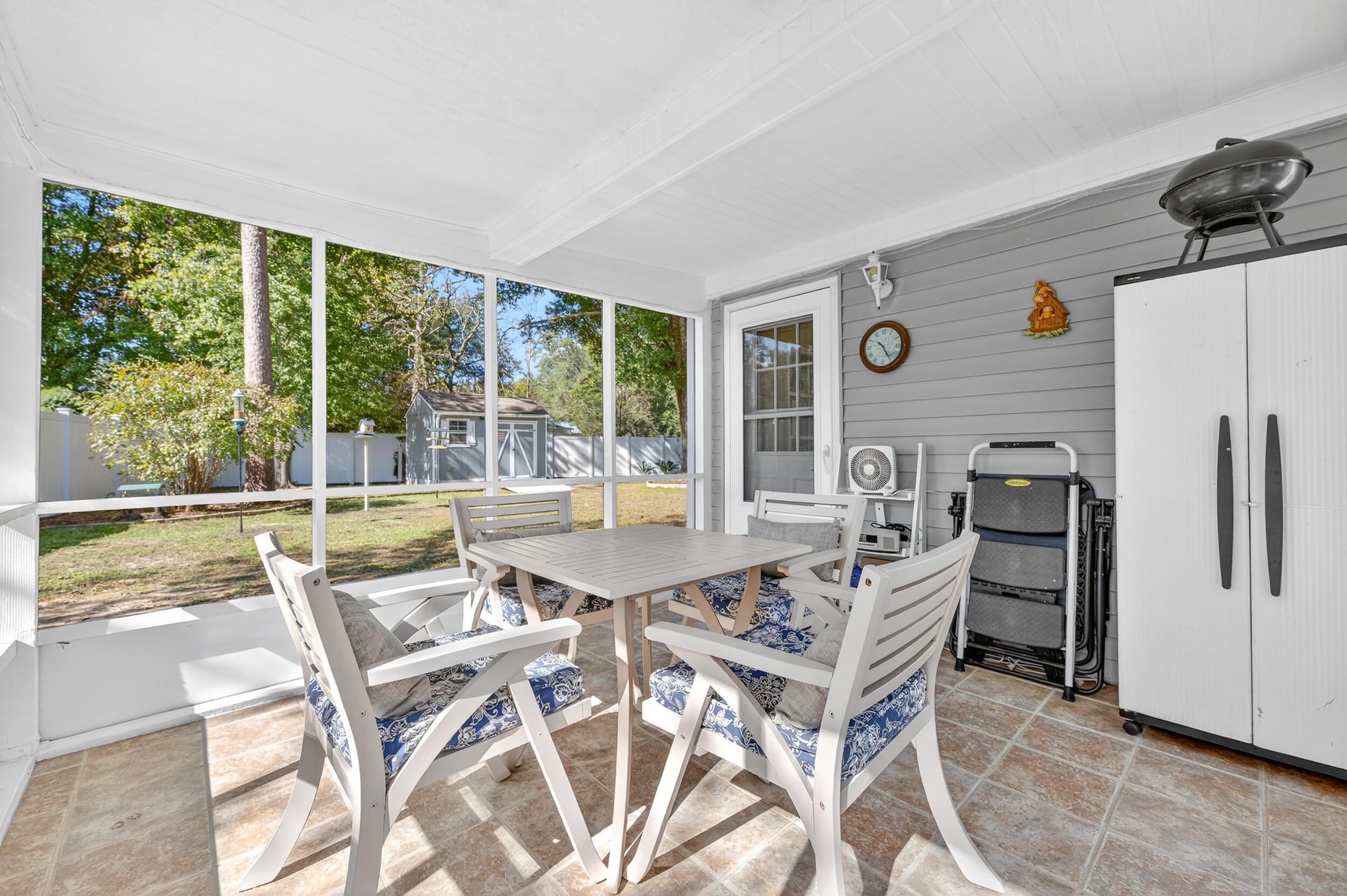 105 Cedar Point Road Crestview, FL 32539 - Photo 40 of 53 a dining room with furniture and large window