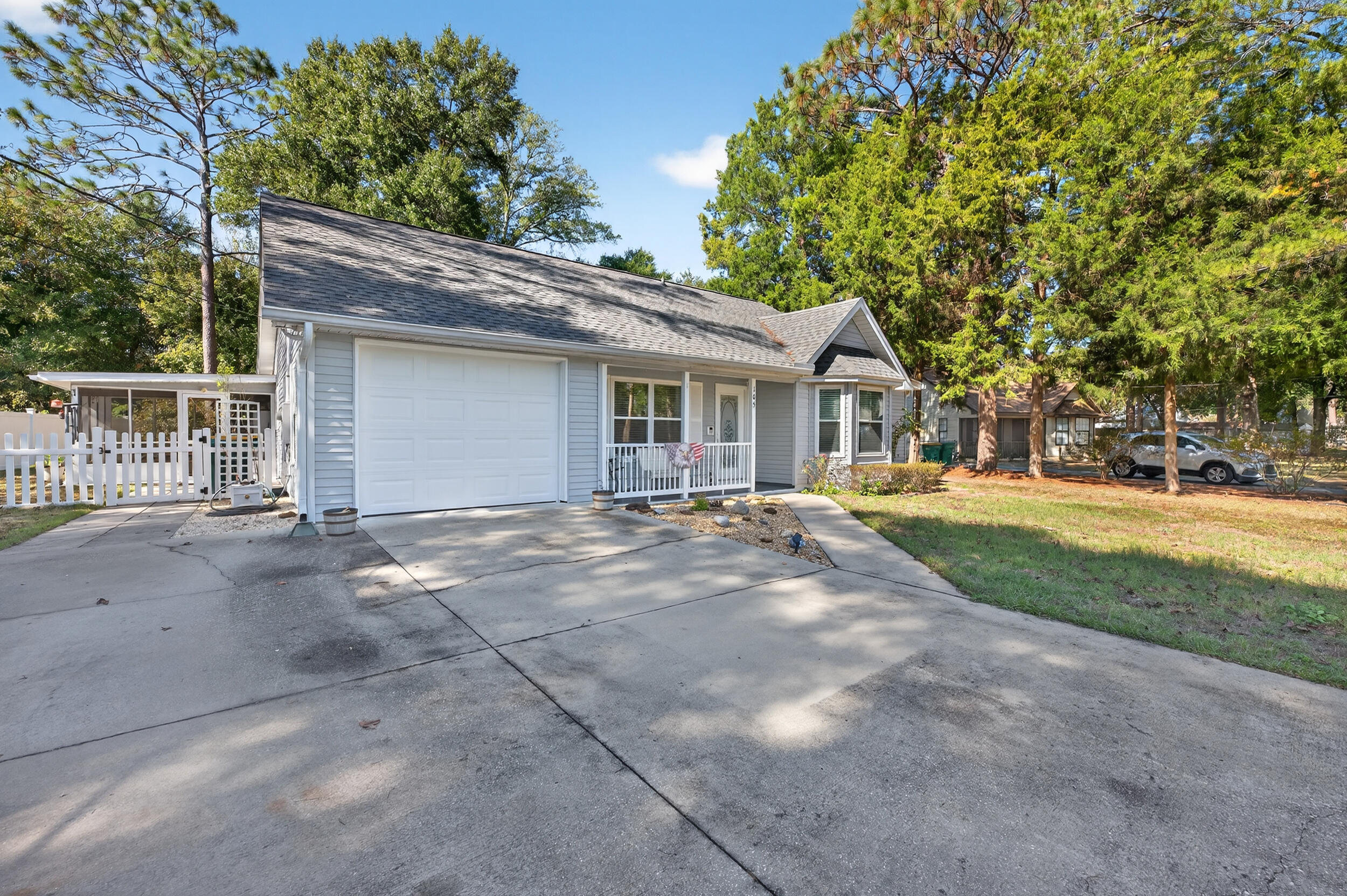 105 Cedar Point Road Crestview, FL 32539 - Photo 4 of 53 a view of a house with a yard