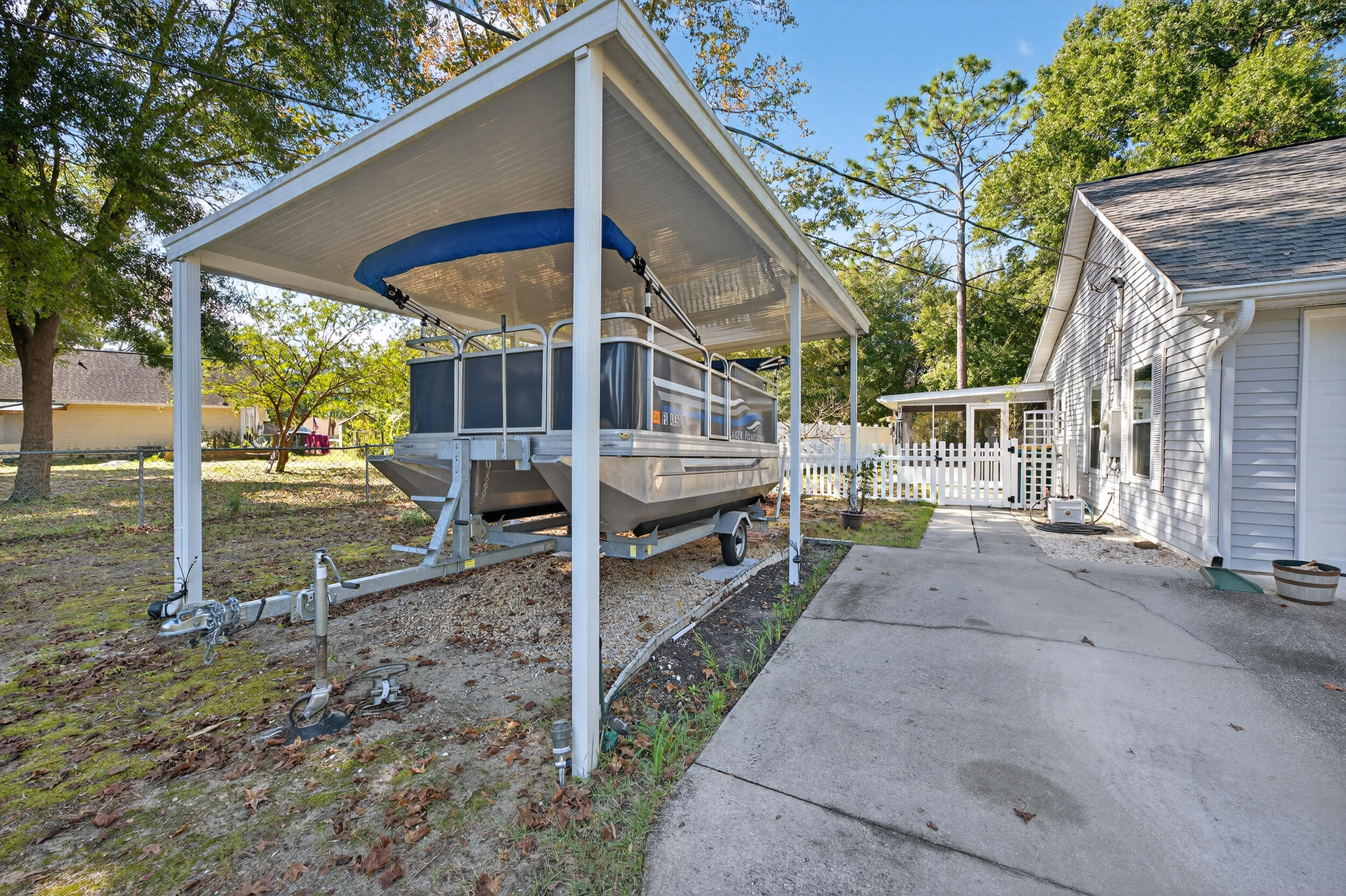 105 Cedar Point Road Crestview, FL 32539 - Photo 51 of 53 a view of a house with backyard and a tree