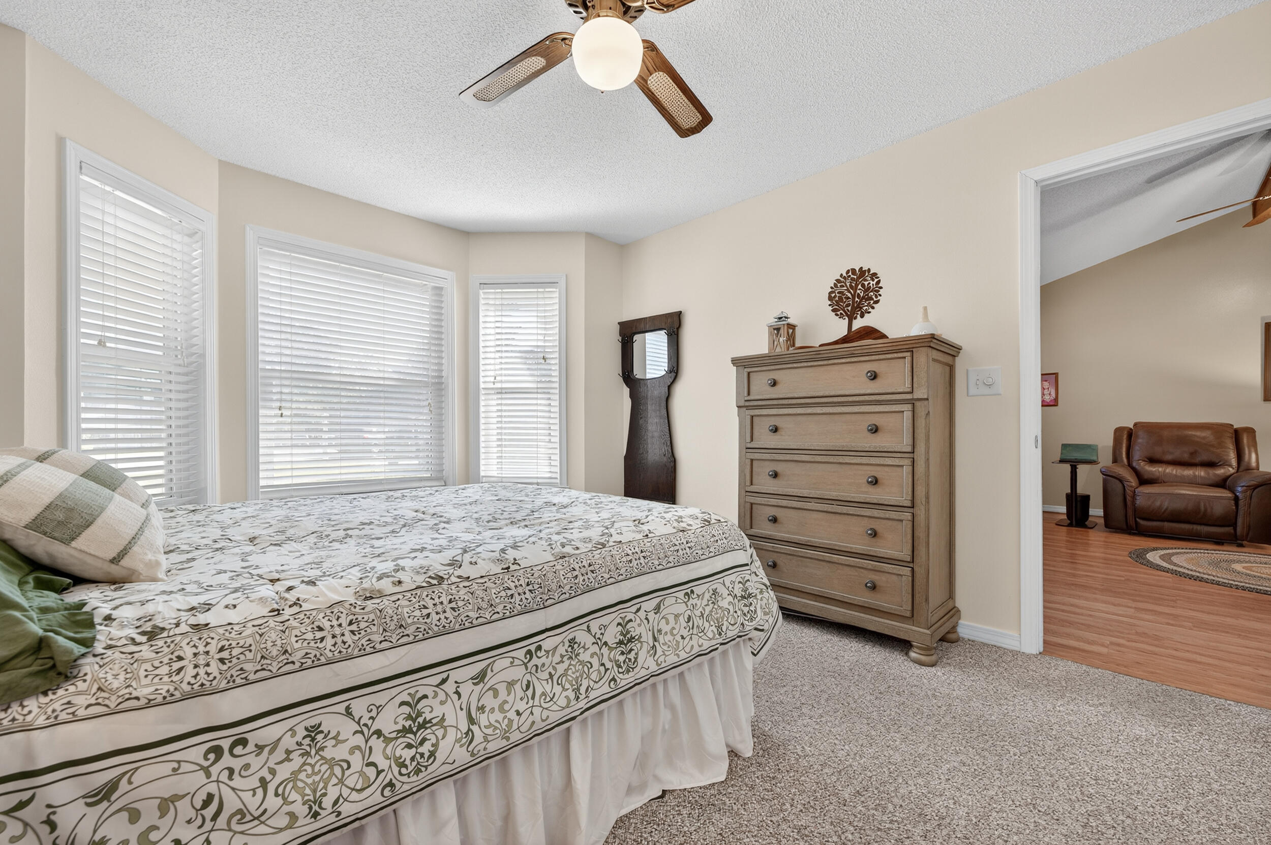 105 Cedar Point Road Crestview, FL 32539 - Photo 9 of 53 a bedroom with a bed and a dresser