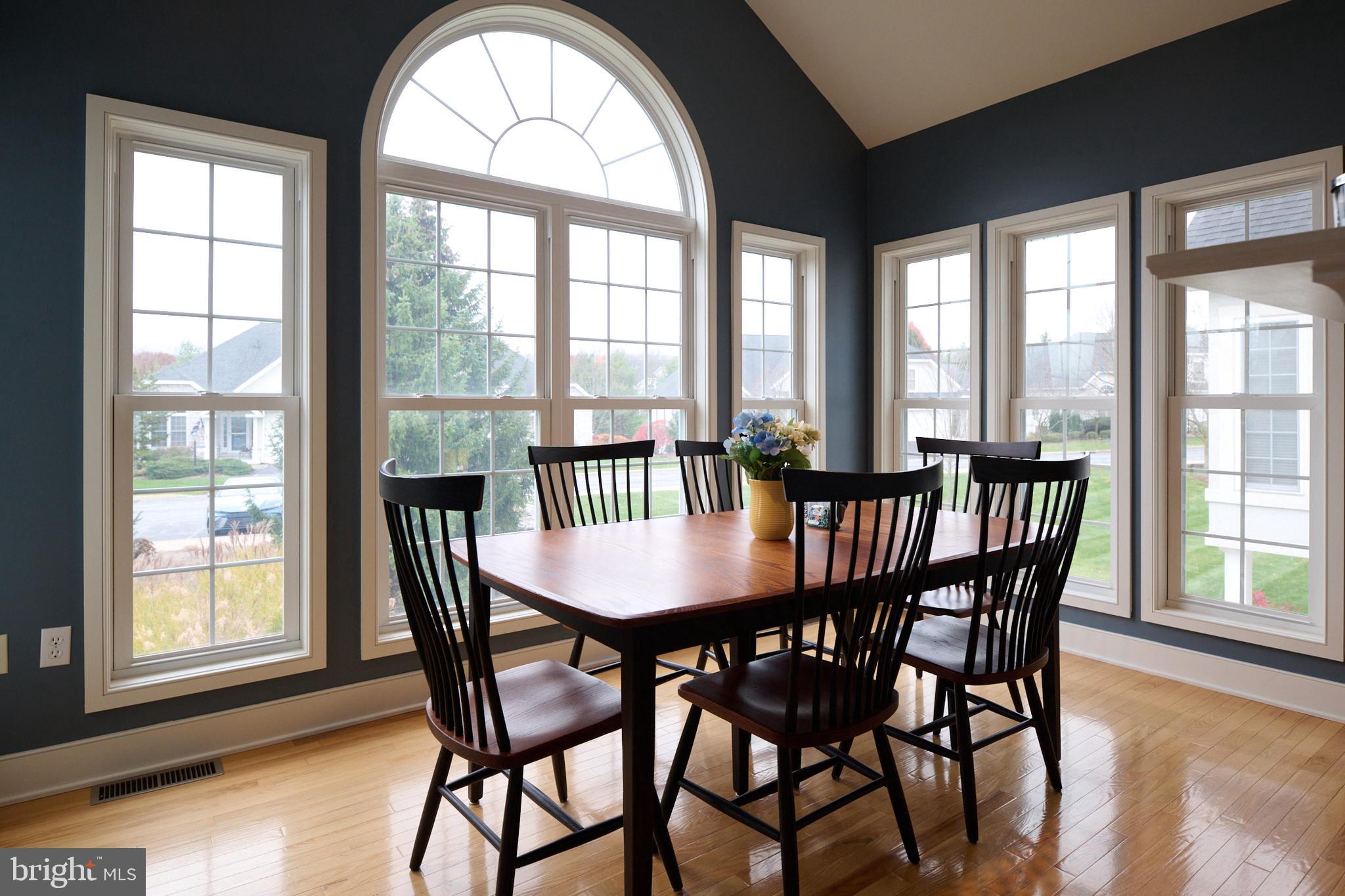 3296 Shellers Bend, Unit 144 State College, PA 16801 - Photo 18 of 48 a view of a dining room with furniture and windows