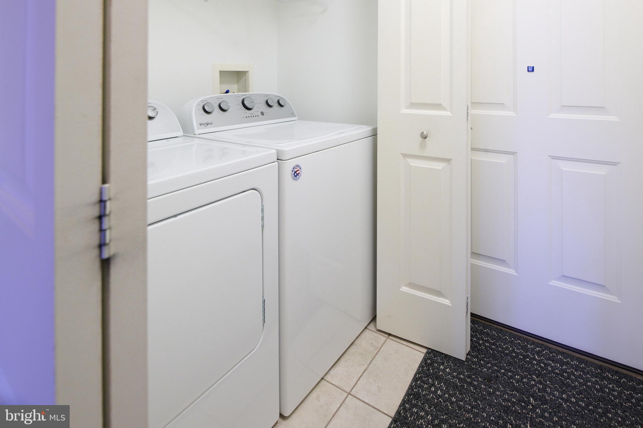 3296 Shellers Bend, Unit 144 State College, PA 16801 - Photo 19 of 48 a utility room with dryer and washer