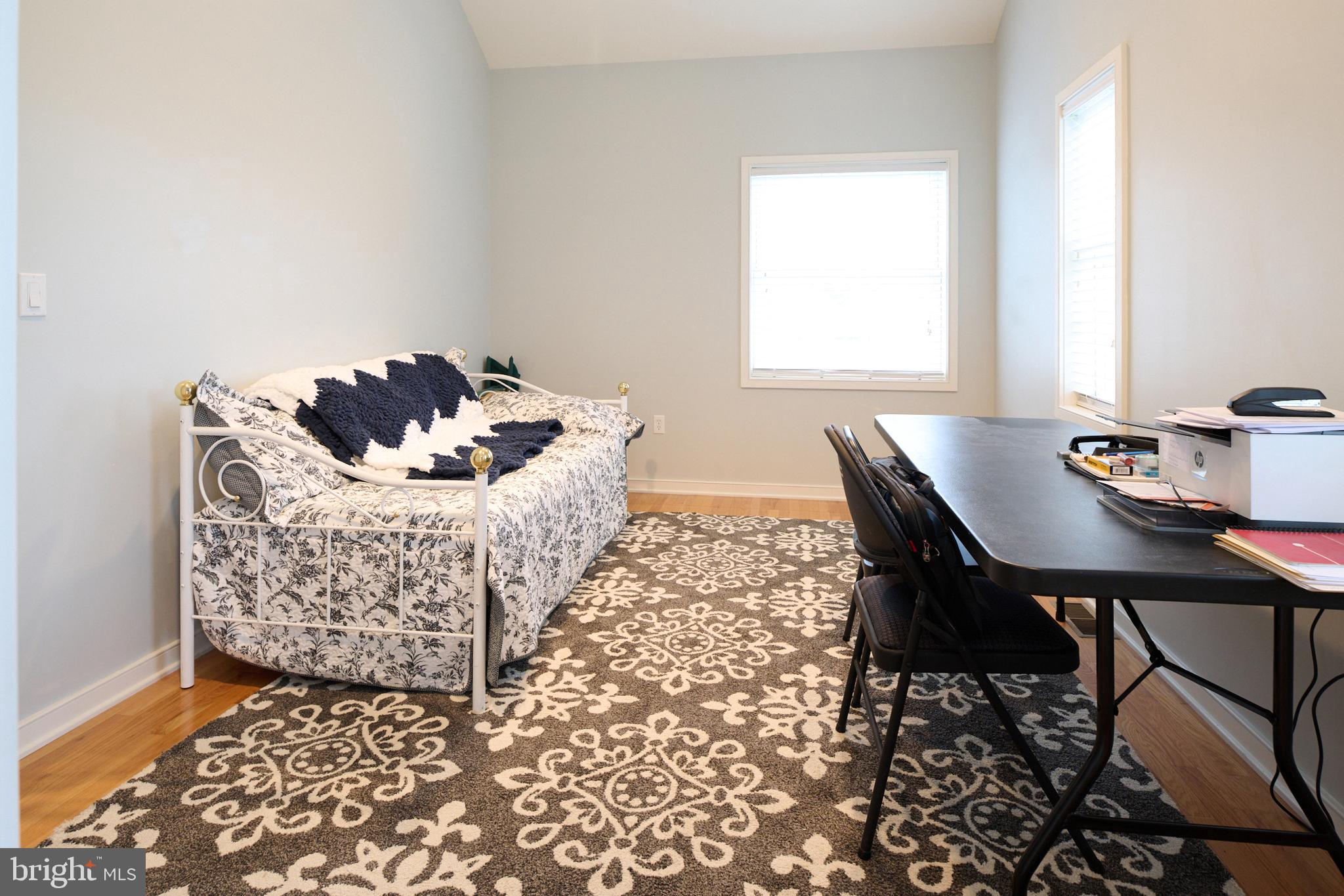 3296 Shellers Bend, Unit 144 State College, PA 16801 - Photo 21 of 48 a living room with furniture and a window