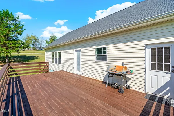 a balcony view with a seating space