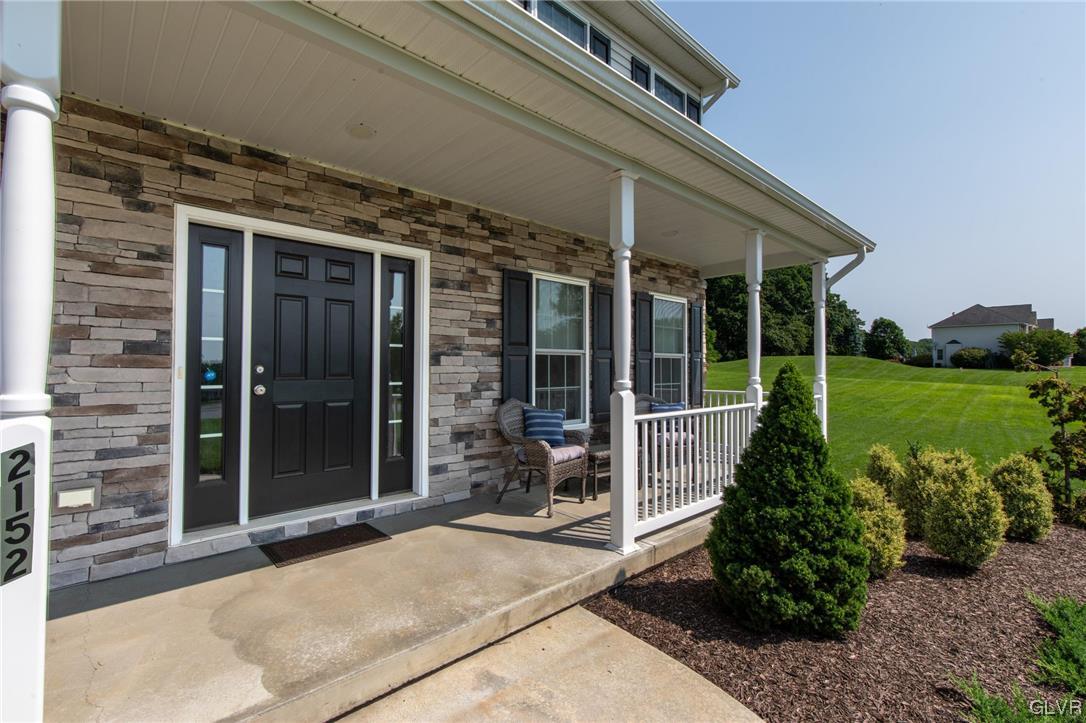 2152 Terry Road Nazareth, PA 18064 - Photo 14 of 42 a front view of a house with a garden
