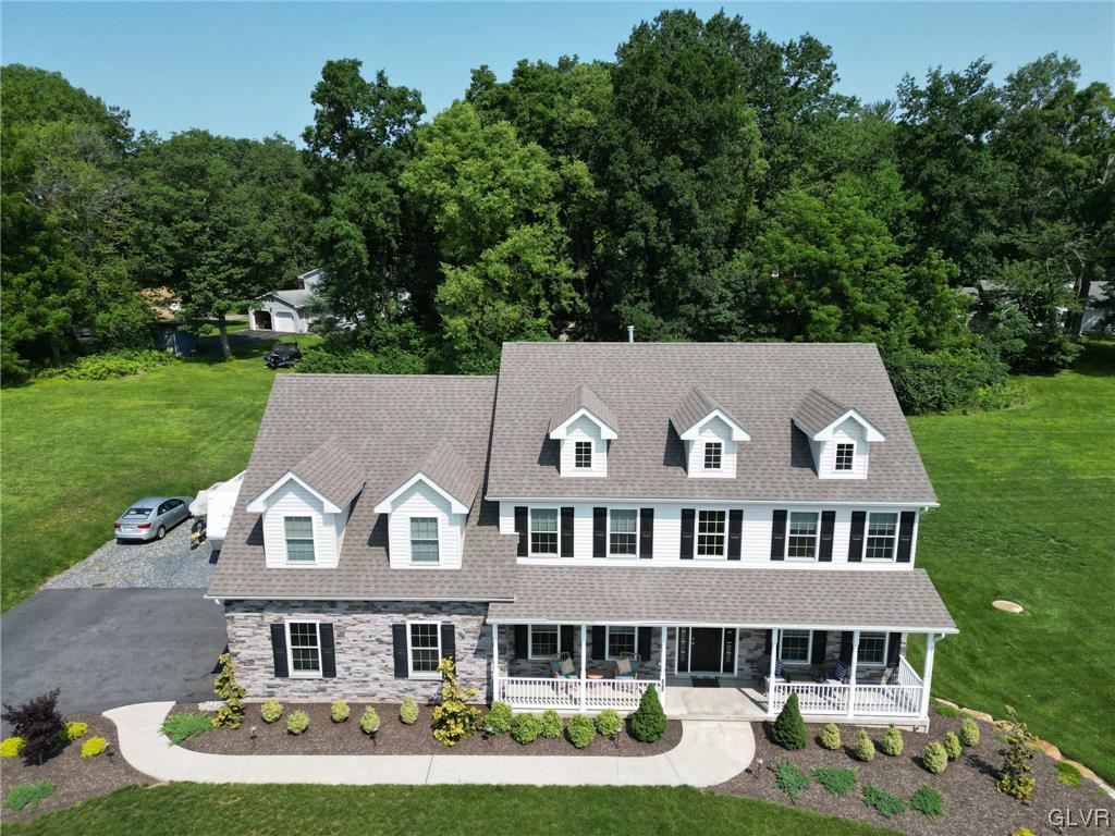 2152 Terry Road Nazareth, PA 18064 - Photo 2 of 42 front view of a house with a garden