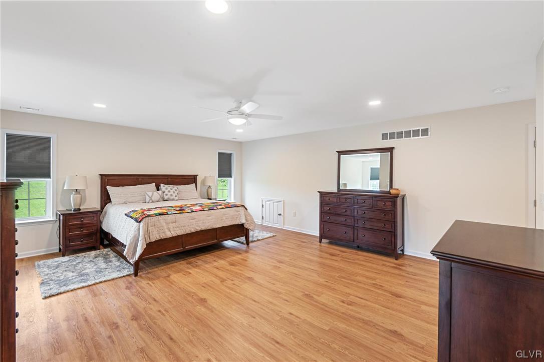 2152 Terry Road Nazareth, PA 18064 - Photo 34 of 42 a bedroom with a bed and wooden floor