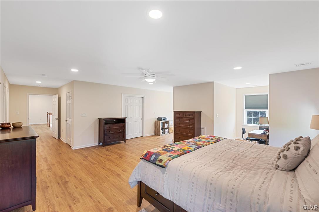 2152 Terry Road Nazareth, PA 18064 - Photo 36 of 42 a bedroom with a large bed and a flat screen tv