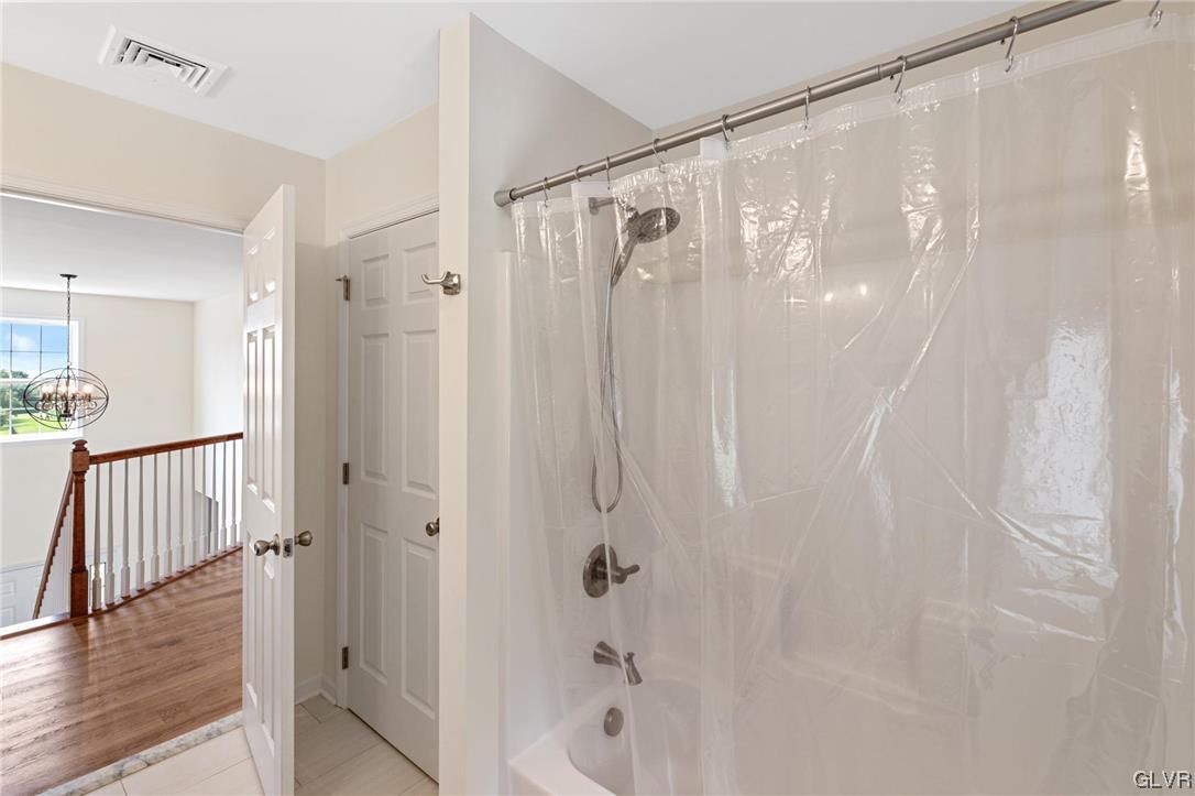 2152 Terry Road Nazareth, PA 18064 - Photo 38 of 42 a bathroom with a shower and a tub