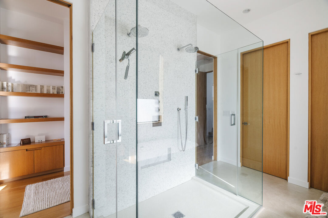 44 Horizon Avenue Venice, CA 90291 - Photo 19 of 33 a bathroom with a shower and a glass door