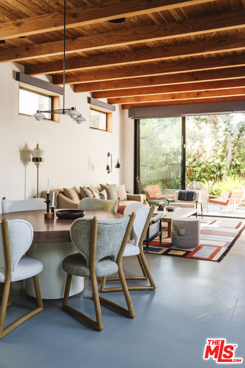 44 Horizon Avenue Venice, CA 90291 - Photo 8 of 33 a dining room with furniture and a floor to ceiling window