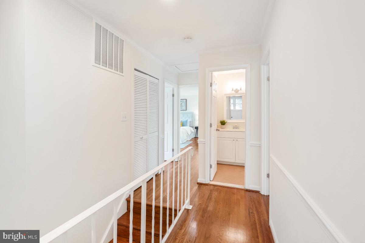 1816 Bart Drive Silver Spring, MD 20905 - Photo 13 of 38 a view of a hallway with wooden floor